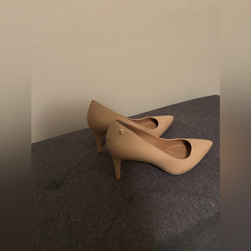 Classic Nude Pointed-Toe Pumps - Women